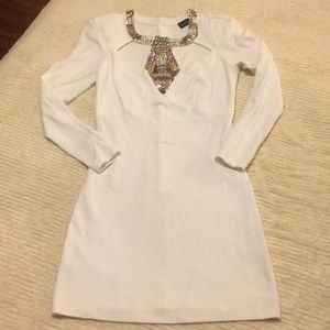 Cream mini-dress with gold detailing